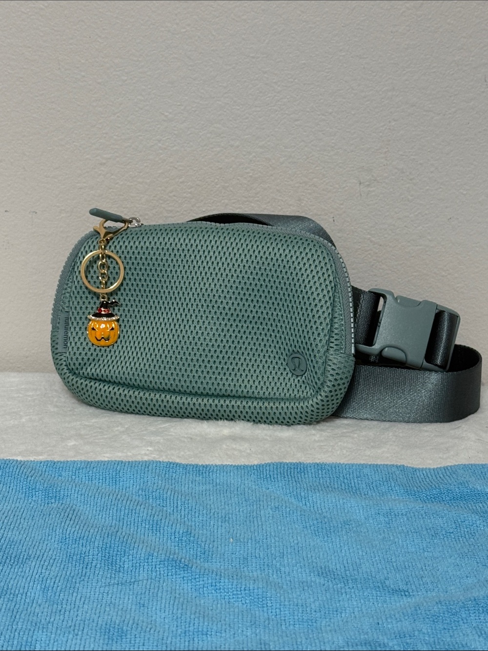 lululemon athletica Mesh Belt Bag in Sage Green with Pumpkin Charm